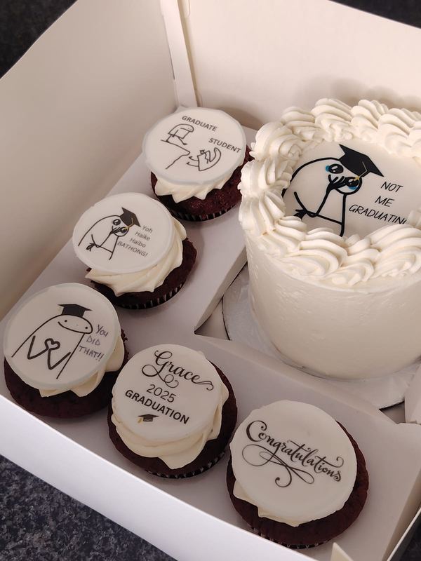 Graduation bento cake with hand-illustrated red velvet cupcakes in a gift box
