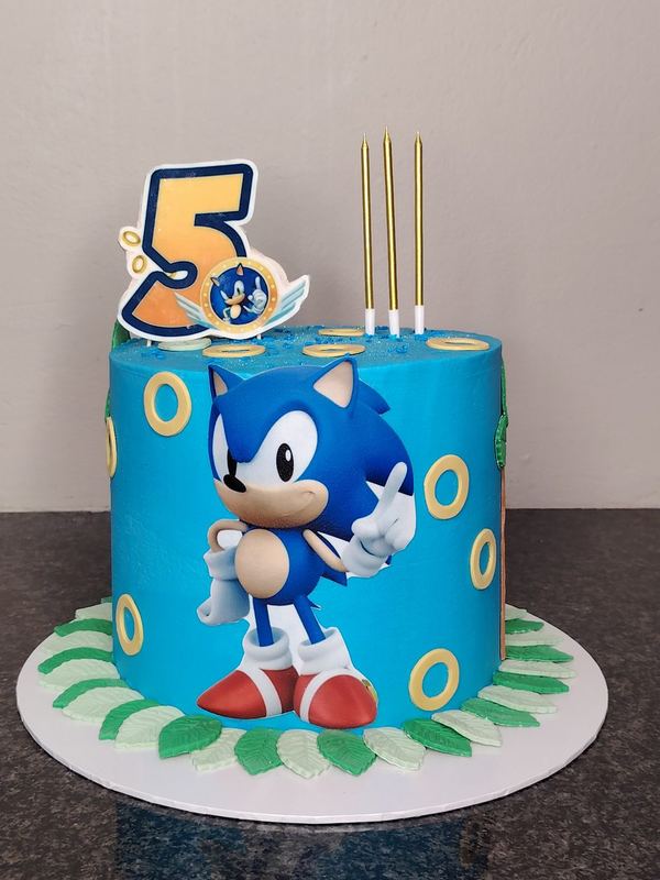 Blue Sonic the Hedgehog character cake for a 5th birthday