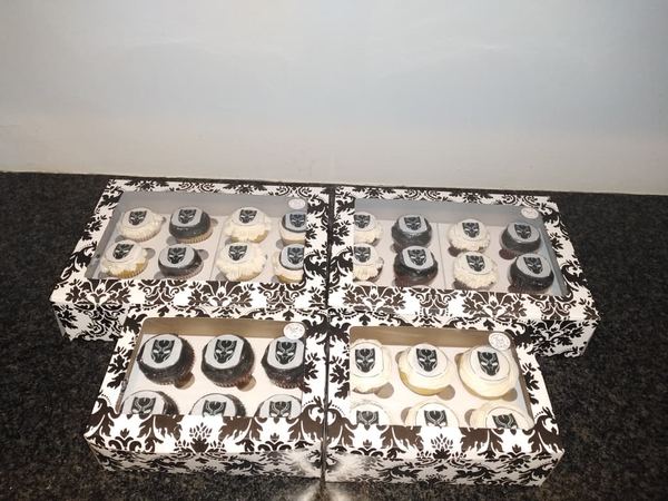 Black and white themed cupcakes in damask boxes